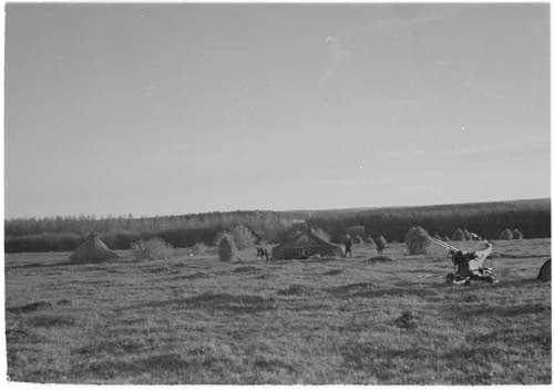 38.It.Ptrin tuliasema-aluetta, yleiskuva, taustalla metsän yläpuolella Kerimäen kirkko, etäisyys n. 10 km.
